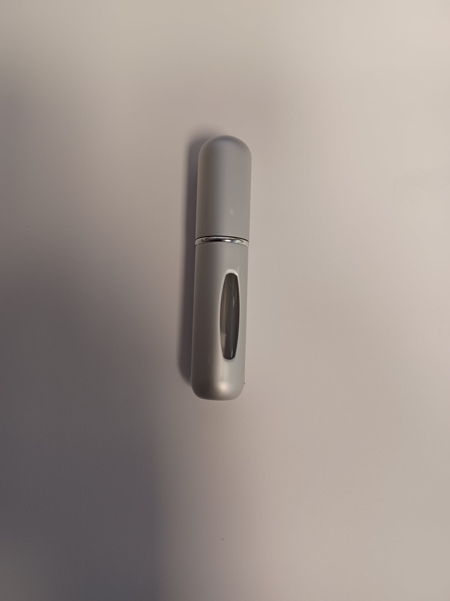 MATTE SILVER TRAVEL BOTTLE