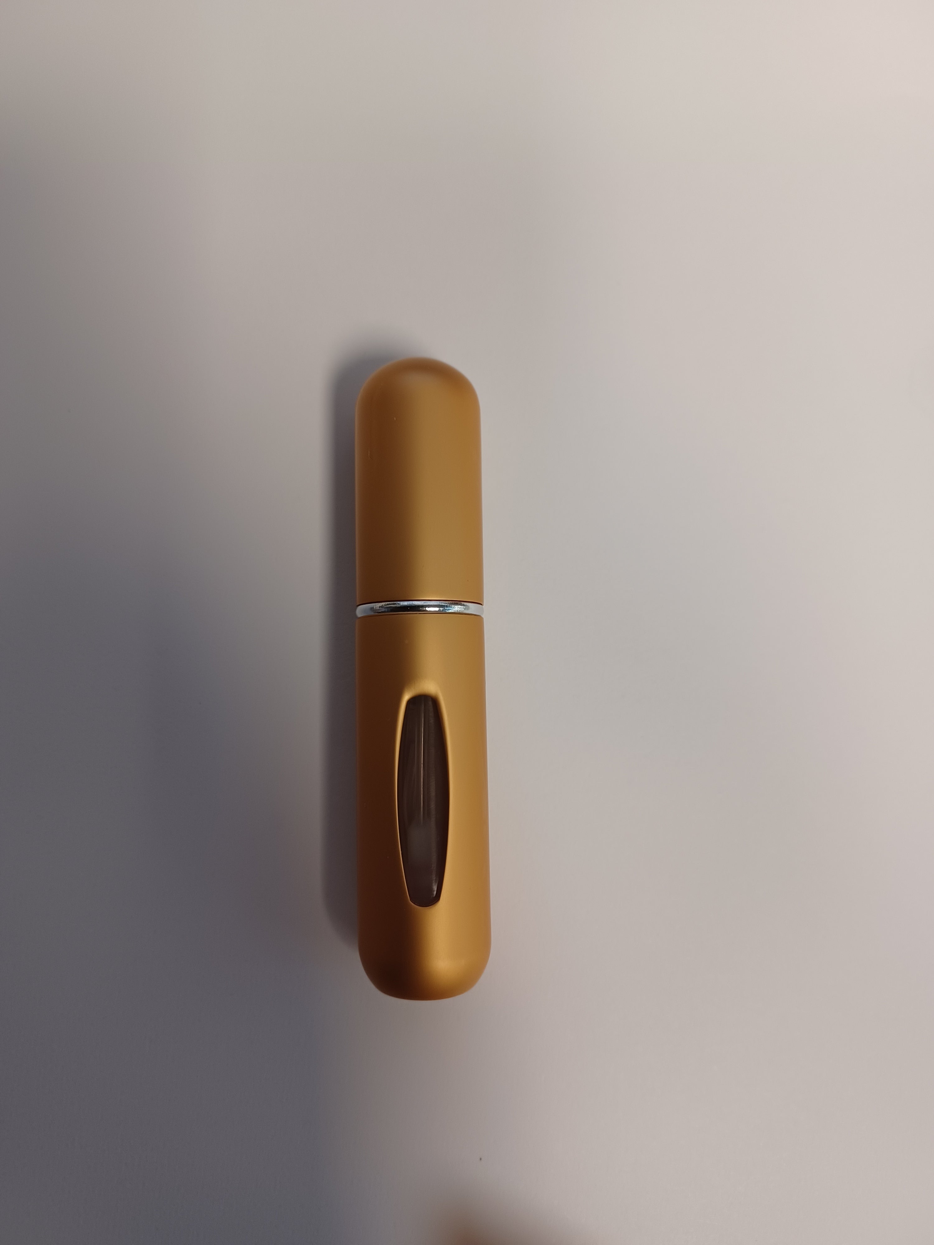 MATTE GOLD TRAVEL BOTTLE