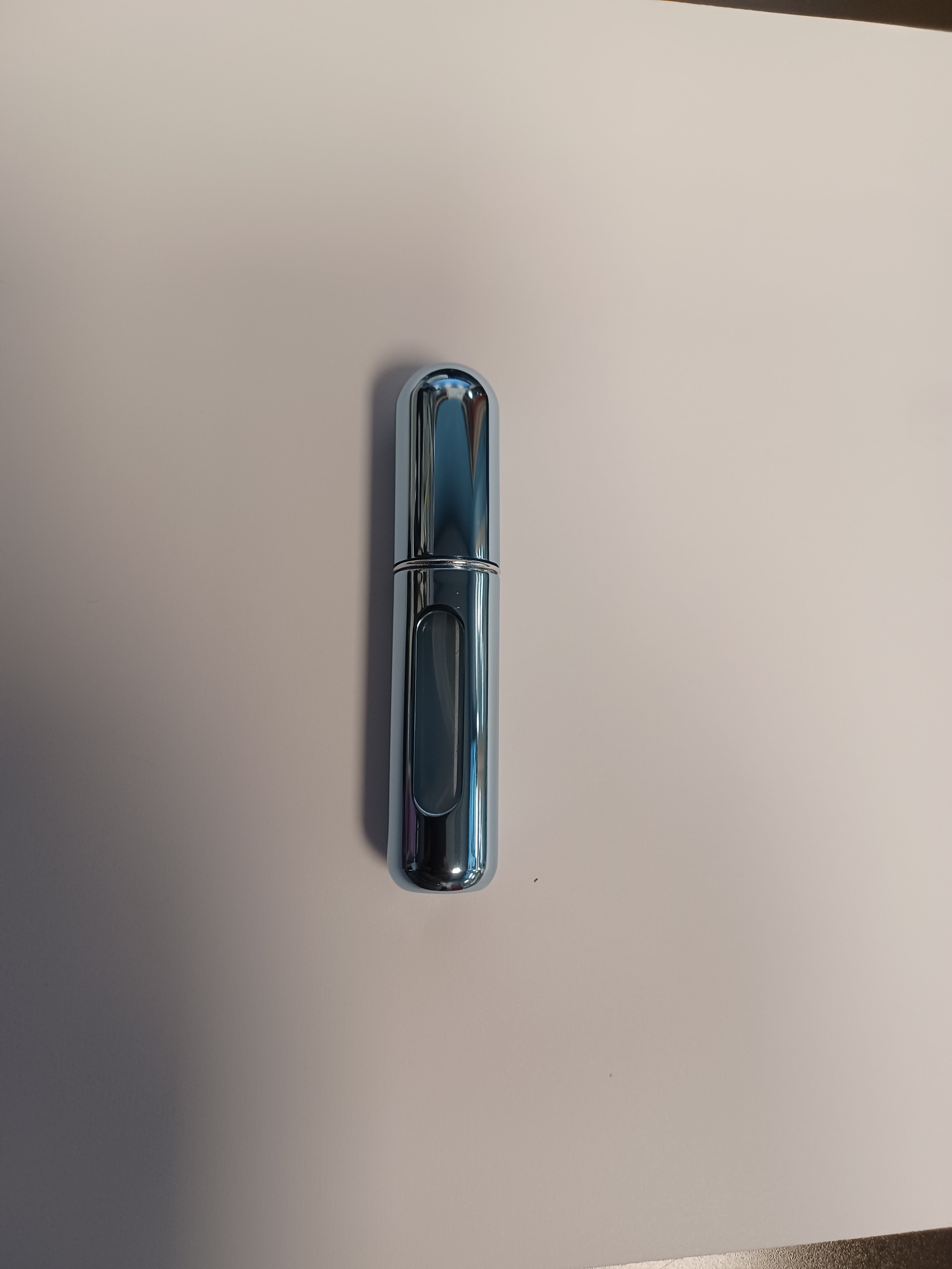 SHINY BABY BLUE TRAVEL BOTTLE